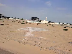 Rare Investment Opportunity – Prime Adjoining Plots for Sale in Al Muzairah