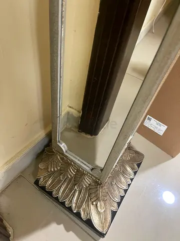 Elegant Silver Decorative Mirror with Ornate Base