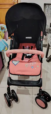 Cute and Compact Pink Stroller for Sale!