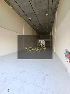 Shop for rent in Al Jurf 2 near Ajman Court, 2,000 sq.ft on main road, ideal for retail or café, AE