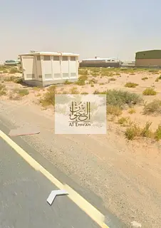 Land for sale in Al-Hawshi, corner plot