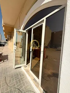 A commercial-residential building in the Emirate of Sharjah, Muweilah Commercial area, with a prime