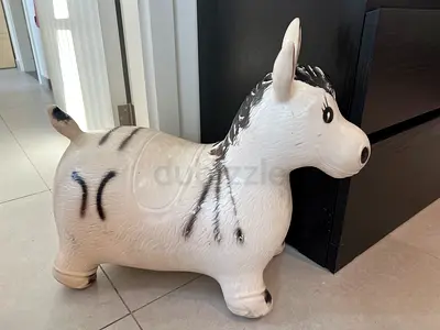 Inflatable bouncing toy horse