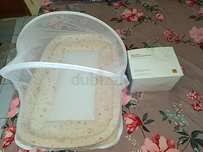 Baby Nest with Electric Breast Pump..like new
