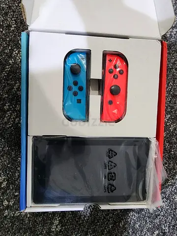 Nintendo Switch Console with Joy-Con Controllers