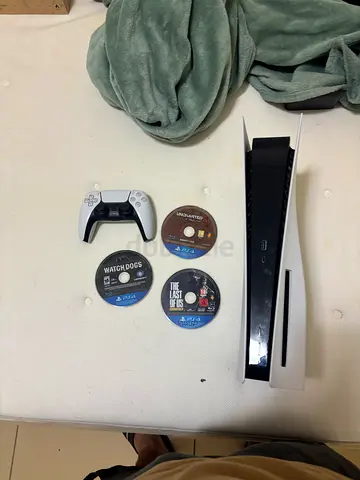 Like-New Sony PlayStation 5 with Games and Controller