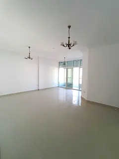 For annual rent in Sharjah, Al Taawun area: 3 bedrooms, a living room, 3 bathrooms, and a balcony di