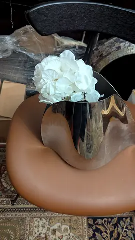 Modern Chrome Vase with White Flowers