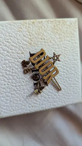 Elegant Dior Brooch with Decorative Charms