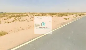 Residential Investment Land for Sale in Rawdat Al Qarat – On a 36-meter main road – prime and ea