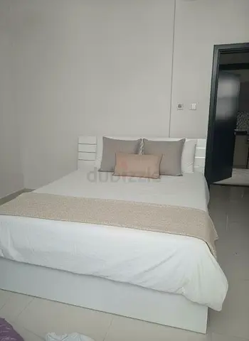 Contemporary White Bed Frame with with 6drawer dresser with side tables
