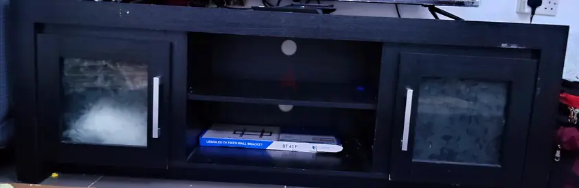 Sturdy Black TV Cabinet with Glass Doors