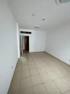 For annual rent in Sharjah: a one-bedroom apartment with a living room, bathroom, and balcony. Great