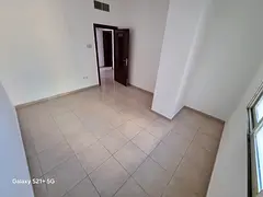 For annual rent in Sharjah, Al Qasimia area: 2 bedrooms, a living room, 2 bathrooms, and a balcony.