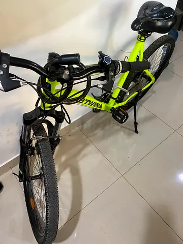 B’TWIN Rockrider Mountain Bike (Green) – Excellent Condition + Free Equipment