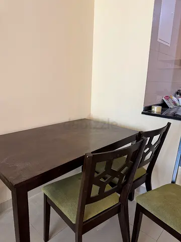 Sturdy Dining Table with Elegant Chairs