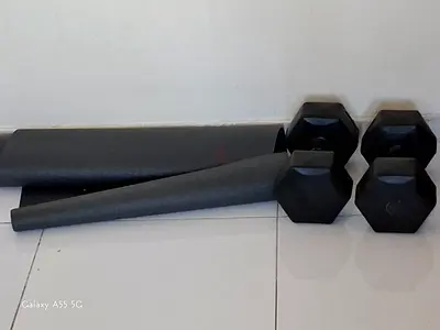 Set of Dumbbells and Workout Rollers for Home Gym