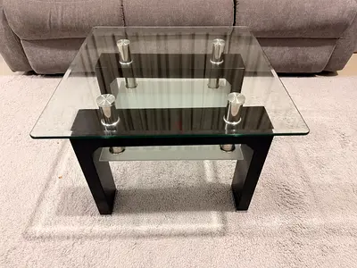 Stylish Glass and Black Coffee Table