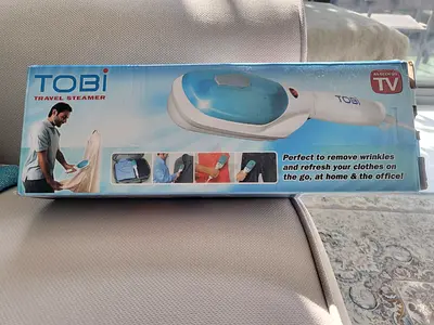 travel steam iron (new unused)