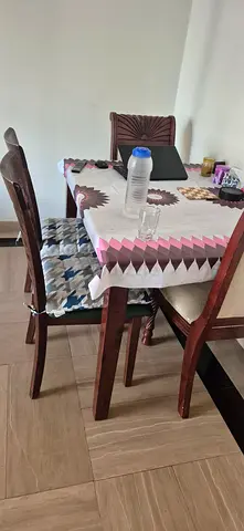 4 seater wooden dinning table