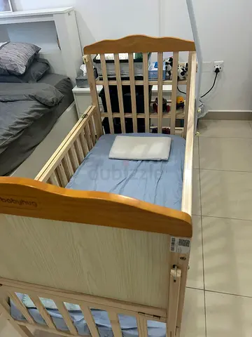 Lightly Used Wooden Baby Crib - Perfect for Newborns