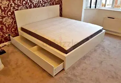 IKEA malam king‑size bed (180 × 200 cm) with 2 storage drawers underneath and an IKEA mattress