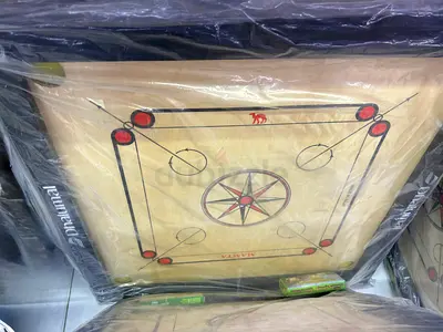 Carom board with discs  perfect condition in original packaging not used
