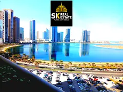 AC FREE _ ONE MONTH FREE _ SEA VIEW 2 BHK _ WITH GYM SWIMMING POOL FREE _ ONLY AED 62000 IN 4 CHQS