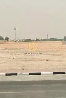 For sale: Residential and commercial land in Al-Falah Camp, Muwaileh Commercial area, with a ground