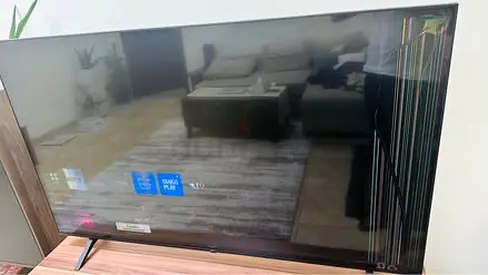 65 Inch LG TV with screen Broken and no Table Legs or Remote