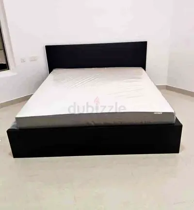IKEA malam king‑size bed (180 × 200 cm) with 2 storage drawers underneath and an IKEA mattress