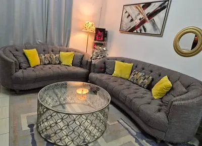 Elegant Grey Sectional Sofa with Coffee Table