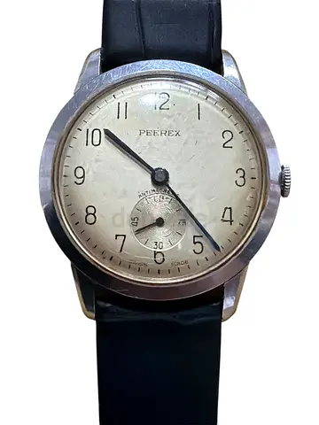 Rare Peerex Vintage Mechanical Gents Watch. Black leather strap. Stainless steel case - 33mm. Nicely
