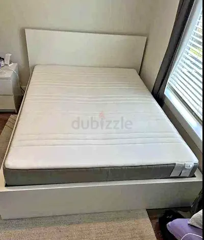 IKEA malam double‑size bed (140 × 200 cm) with 2 storage drawers underneath and an IKEA mattress