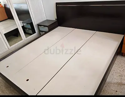 Homes r us Bed with two side tables in excellent condition