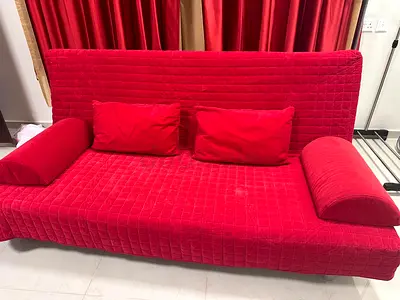Cozy Red Sofa with Cushions