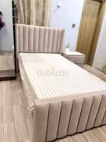 Elegant King-Size Bed with Modern Upholstery