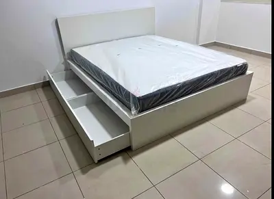 IKEA malam king‑size bed (180 × 200 cm) with 2 storage drawers underneath and an IKEA mattress