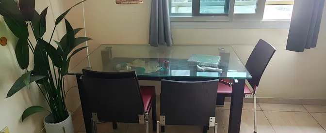 Modern Glass Dining Table with Stylish Chairs