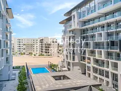 Pool View | Bright Apartment | Ideal Location