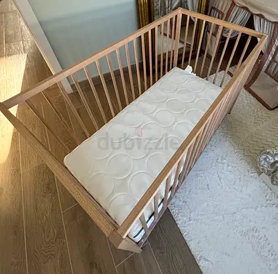 IKEA Stylish Wooden Crib with Comfortable Mattress