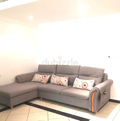 Comfortable Grey Sectional Sofa with Decorative Cushions
