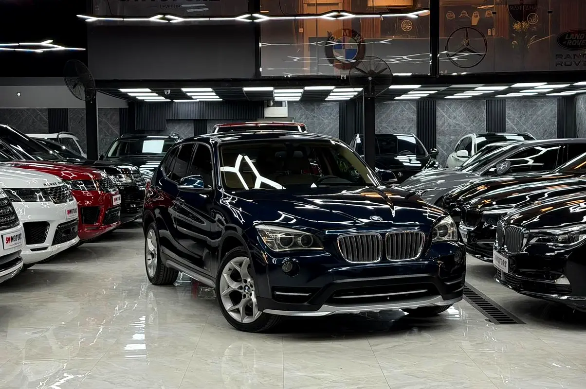 BMW X1 2015 — photo 1 of 13
