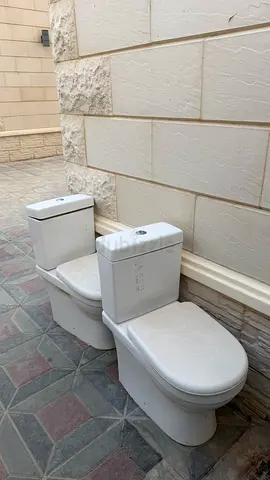 Set of Two White Modern Toilets for Sale