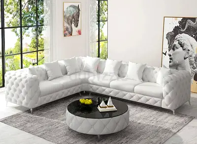 Elegant White Sectional Sofa with Round Coffee Table