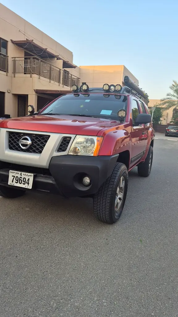 Nissan Xterra 2011 — photo 1 of 18