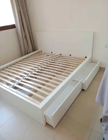 IKEA malam king‑size bed (180 × 200 cm) with 2 storage drawers underneath and an IKEA mattress