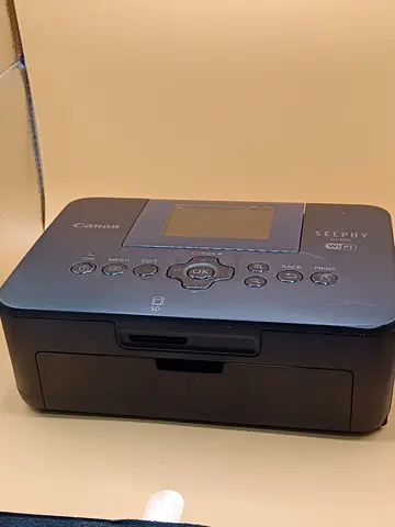 Canon SELPHY CP910 compact photo printer.