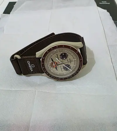 OMEGA swatch Moon swatch Mission to Saturn Speedmaster Brown - Unisex Watch in Excellent Condition