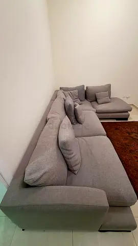 Comfortable Grey Sectional Sofa from the one bought for 20,000aed